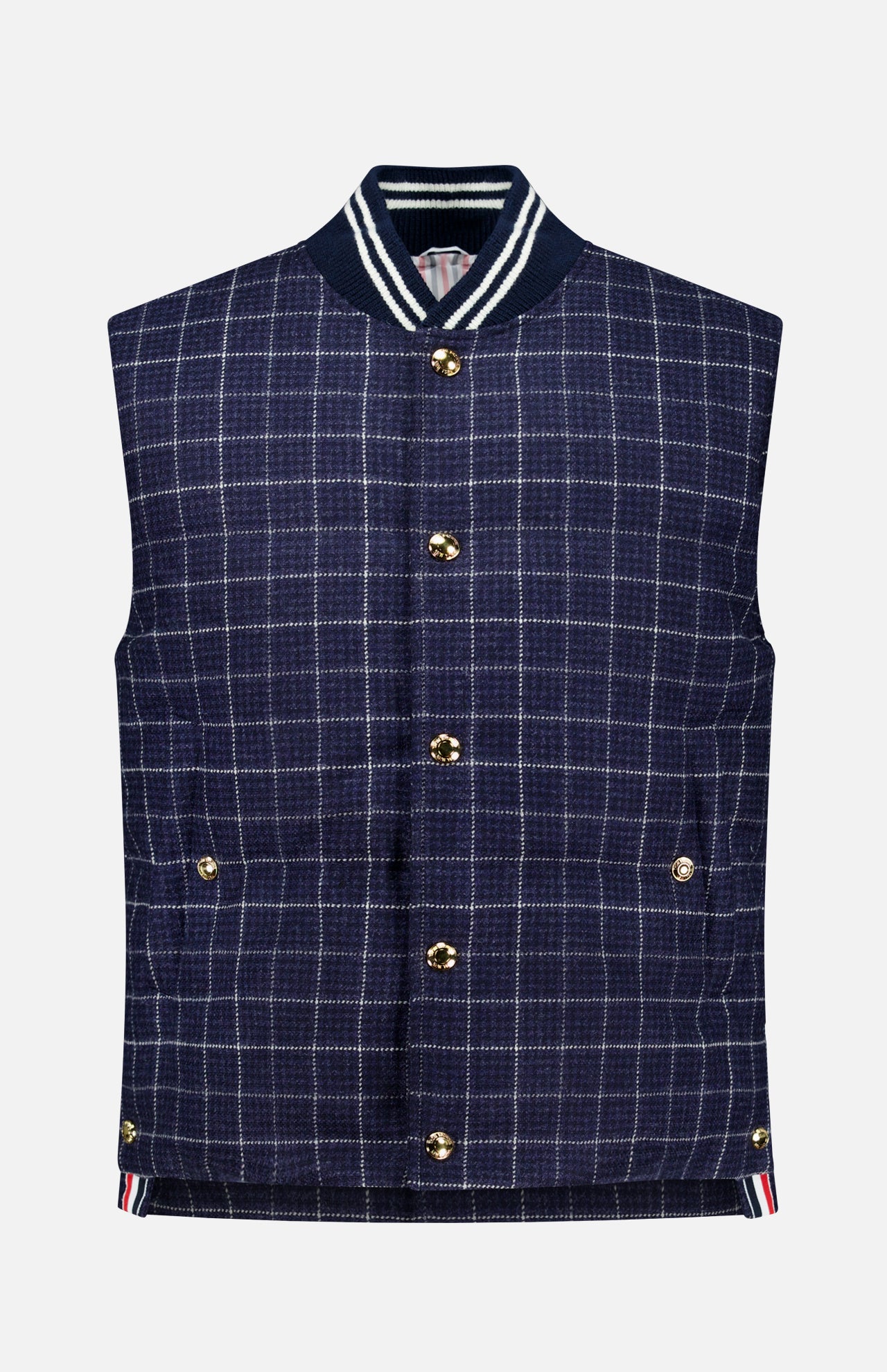 Channeling classic American sensibility, the Houndstooth Teviot Tweed Snap Front Vest by THOM BROWNE features a sleeveless navy blue houndstooth tweed design with gold snaps, two front pockets, and a ribbed collar and hem detailed with white and navy stripes.