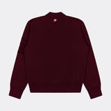 A back view of the THOM BROWNE Milano Stitch Zip Up Bomber Jacket in maroon highlights its ribbed cuffs and hem, along with a small red, white, and black striped tag near the collar—a subtle nod to Americana zip-up style.