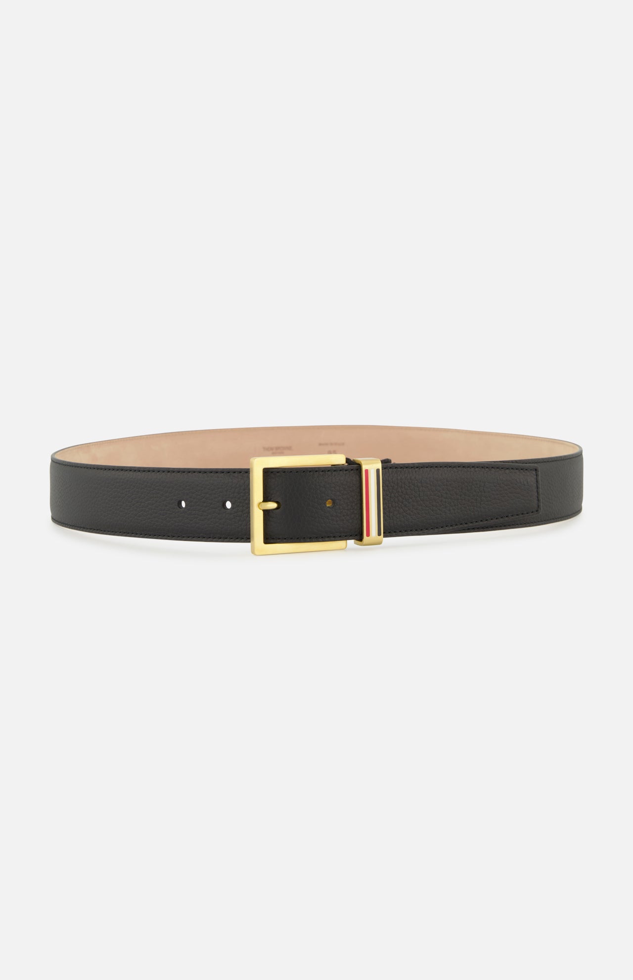The THOM BROWNE Pebble Grain Leather Belt features black leather, a gold rectangular buckle, and a signature red, white, and blue striped detail near the buckle—a timeless men's accessory made in Italy.