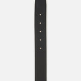 A close-up of the THOM BROWNE Pebble Grain Leather Belt, a classic men's accessory with a pointed end and five holes, crafted in Italy from black leather, shown against a plain white background.