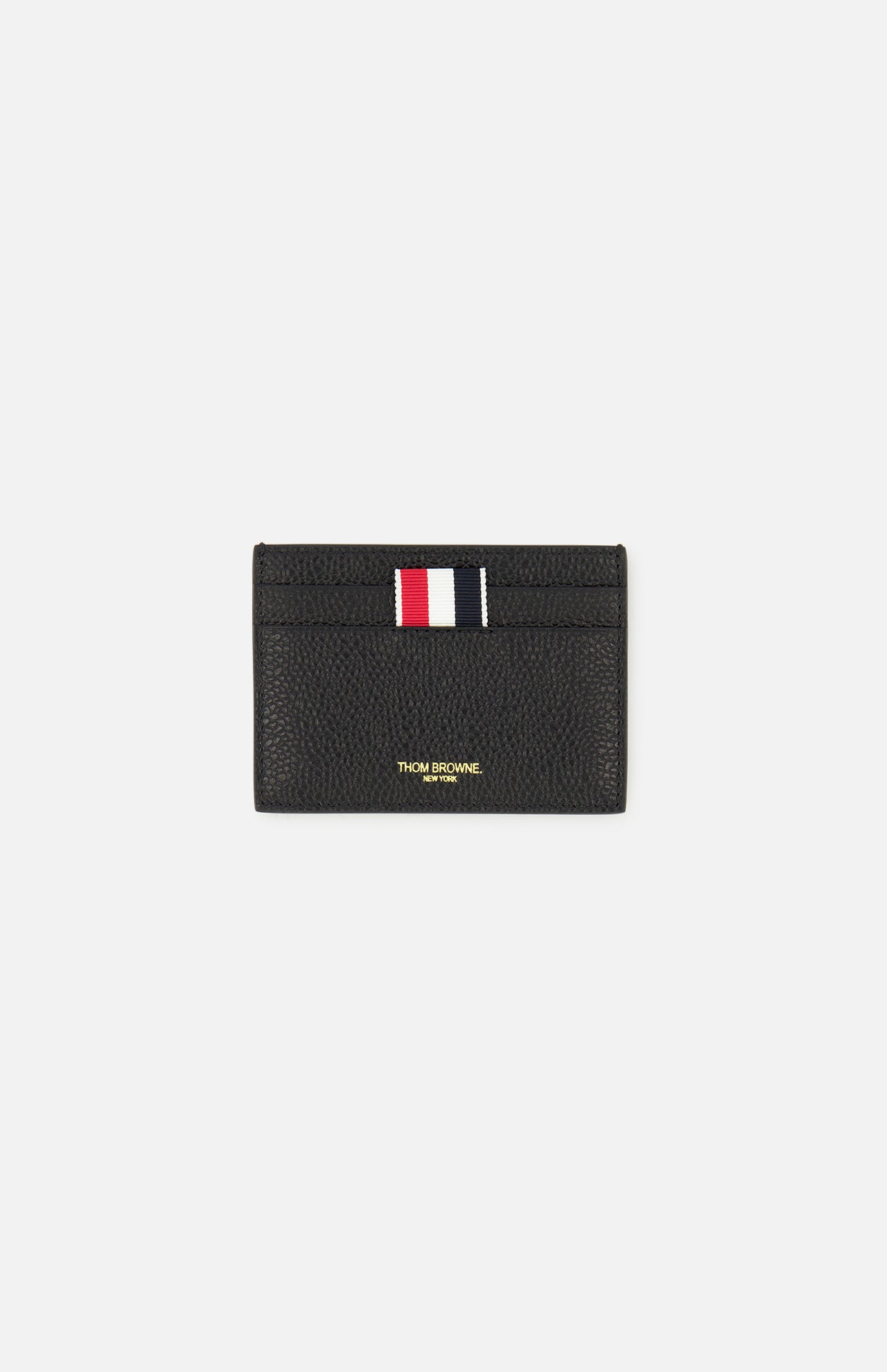 Thom Browne, Inc. Pebble Grain Leather Single Card Holder in black with a red, white, and blue striped tab at the top.