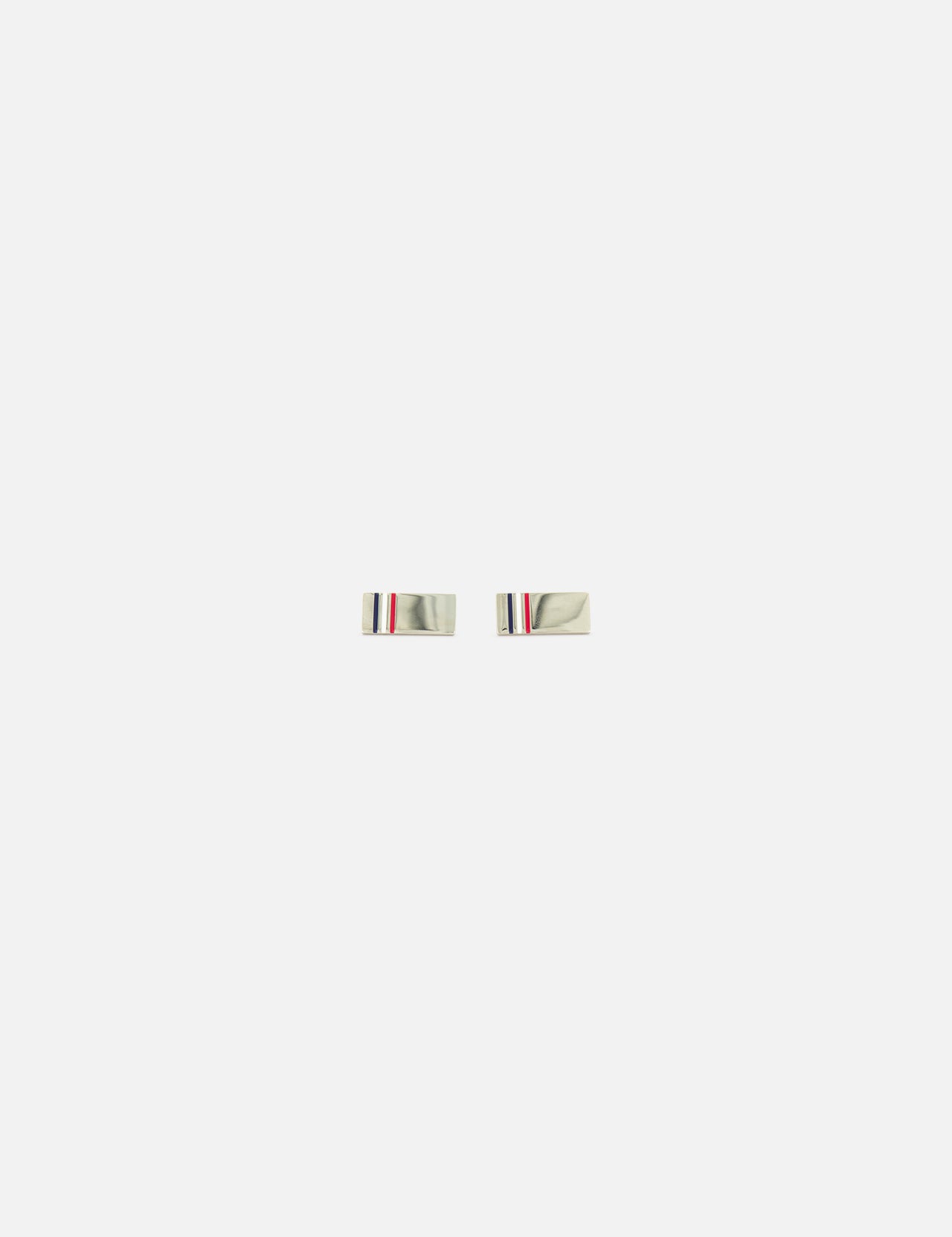A pair of THOM BROWNE RWB Enamel Cufflinks featuring signature red, white, and blue stripe details, presented against a plain white background.