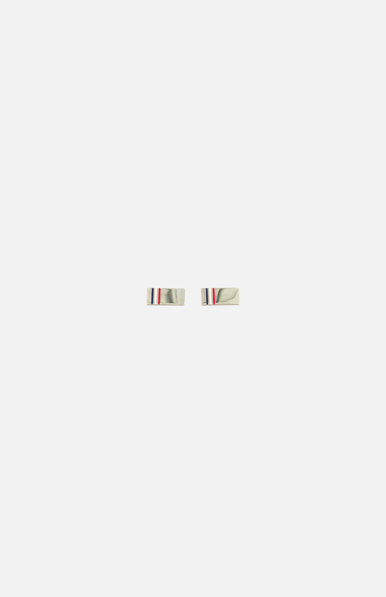 A pair of THOM BROWNE RWB Enamel Cufflinks featuring signature red, white, and blue stripe details, presented against a plain white background.