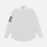 The THOM BROWNE Straight Fit 4 Bar Long Sleeve Oxford Shirt in classic white is shown from the back, featuring four navy stripes on the left sleeve and a signature red, white, and blue loop at the collar.