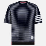 The THOM BROWNE Stripes Jersey Short Sleeve T-shirt features bold white stripes on the left sleeve, a patch on the lower left, and a classic crew neckline—perfect for everyday men's casual style.