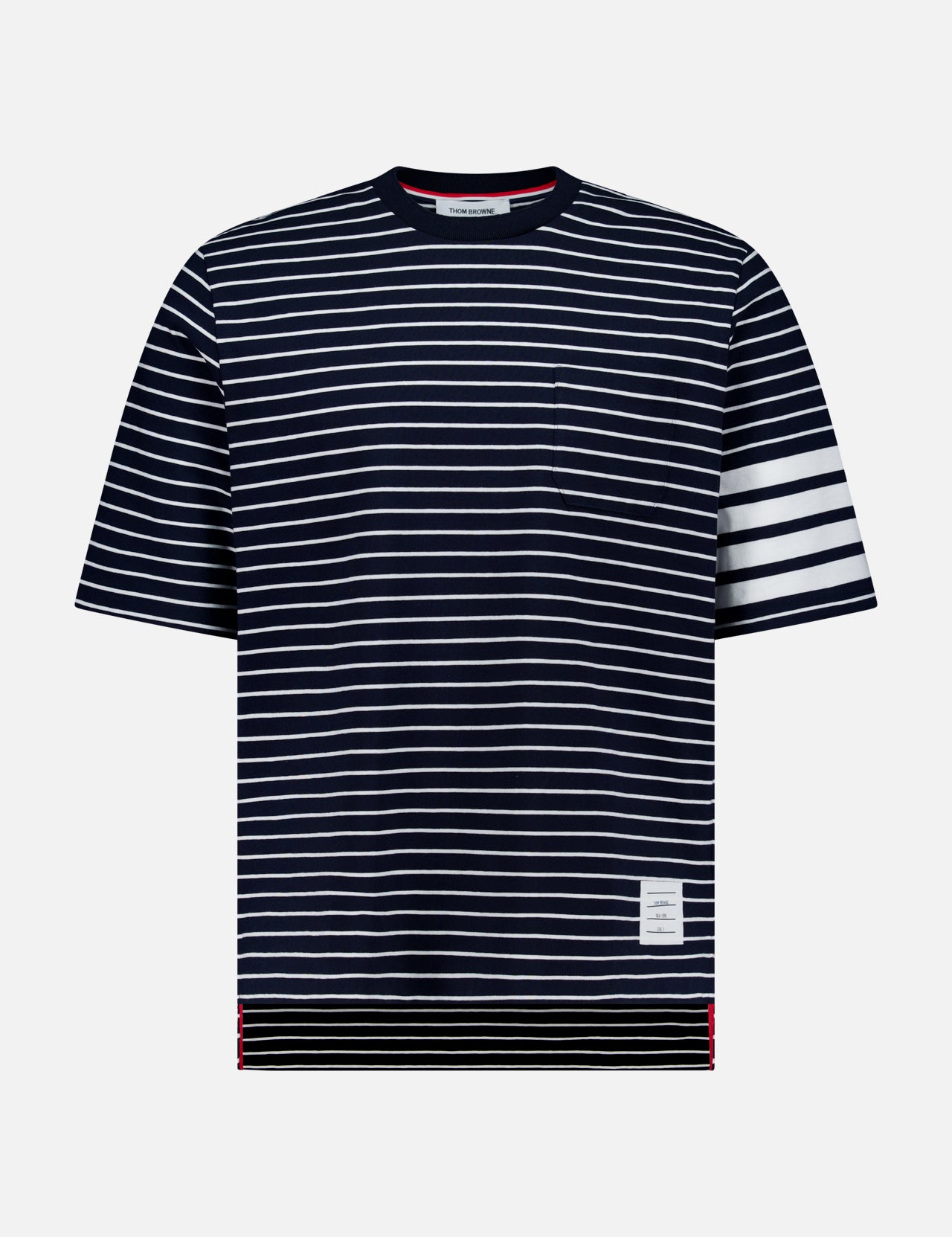 The THOM BROWNE Stripes Jersey Short Sleeve T-shirt features bold white stripes on the left sleeve, a patch on the lower left, and a classic crew neckline—perfect for everyday men's casual style.