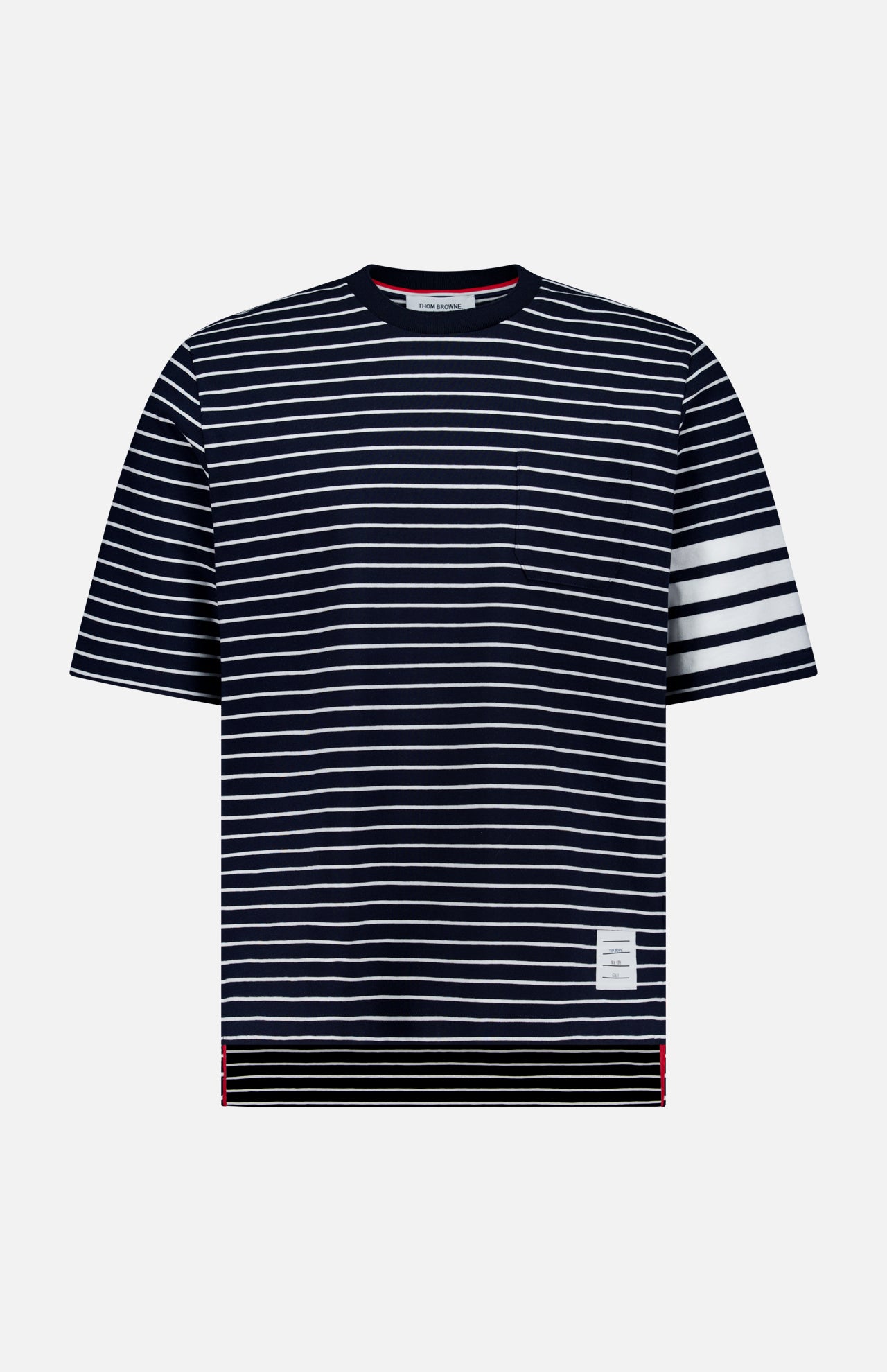 The THOM BROWNE Stripes Jersey Short Sleeve T-shirt features bold white stripes on the left sleeve, a patch on the lower left, and a classic crew neckline—perfect for everyday men's casual style.