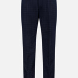 The THOM BROWNE Windowpane Check Cotton Wool Trouser Pant features a navy windowpane pattern, front crease, belt loops, and a slim fit in a soft cotton wool blend.