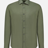 The TINTORIA MATTEI Cotton Long Sleeve Dress Shirt features a plain olive green design with a classic collar, long sleeves, and is crafted from soft cotton, displayed on a white background.