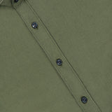Close-up of the TINTORIA MATTEI Cotton Long Sleeve Dress Shirt in olive green, highlighting the collar, black buttons, and a portion of the label inside the collar.