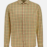 Introducing the Cotton Plaid Dress Shirt by TINTORIA MATTEI—a men’s long-sleeve button-up crafted from cotton, featuring a vibrant yellow base with a striking red and black checkered pattern, showcased against a plain white background.