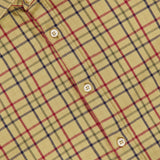 A close-up of the TINTORIA MATTEI Cotton Plaid Dress Shirt for men in beige, featuring a classic red, black, and white plaid pattern. The image highlights the collar and multiple buttons on this timeless long sleeve shirt.