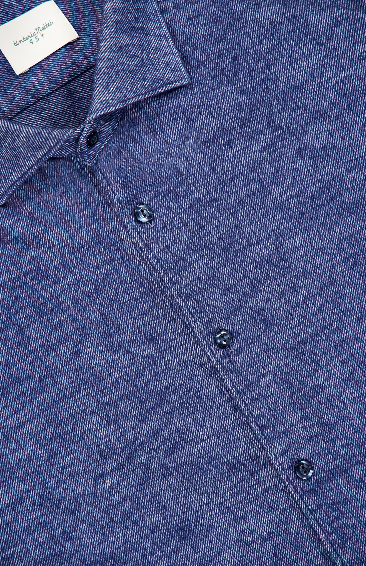 Dark blue Tintoria Mattei Denim-inspired Shirt with a subtle diagonal twill pattern and matching buttons.