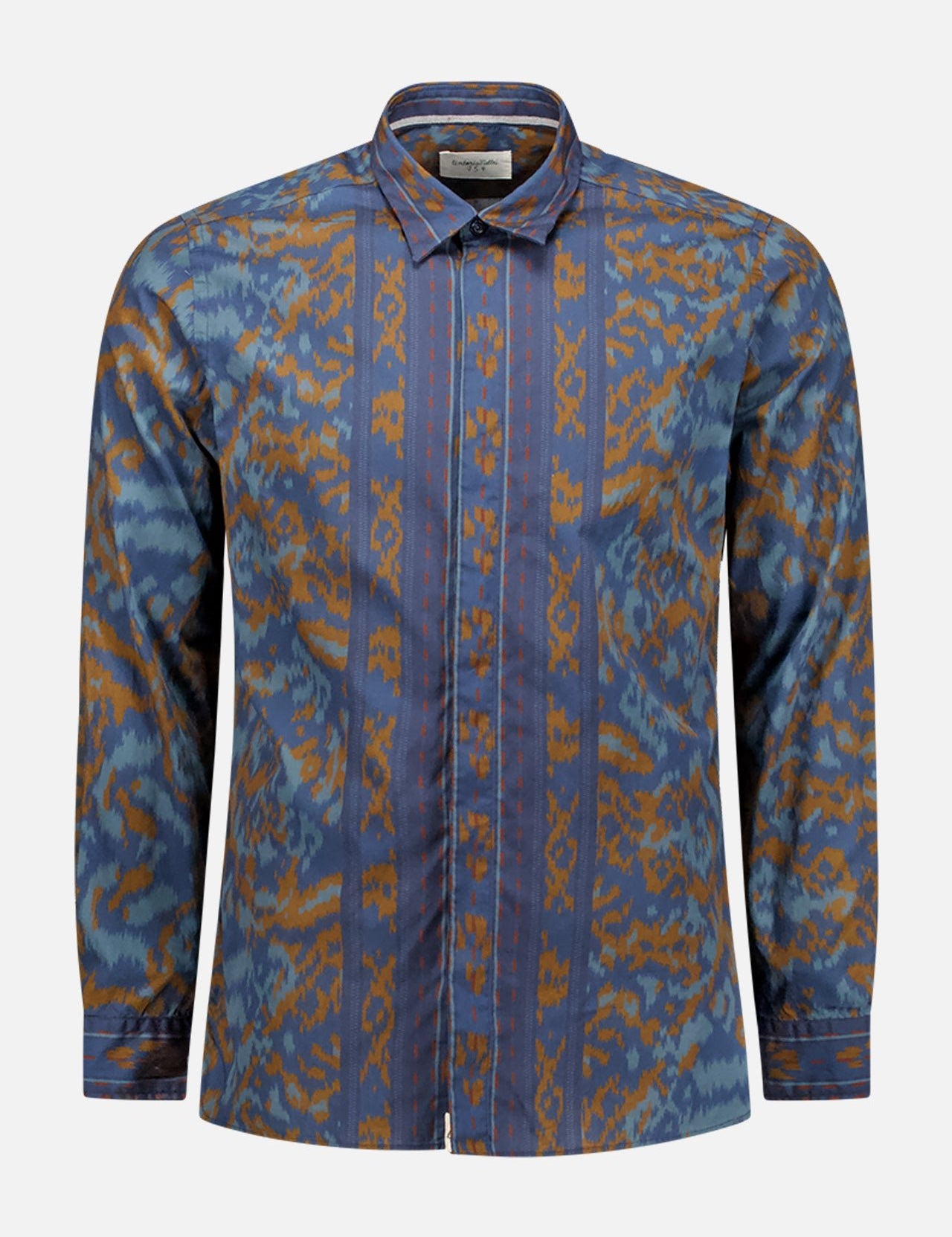 The Printed Shirt by TINTORIA MATTEI is a long-sleeve blue dress shirt with a collar, button-front closure, vertical stripes, and abstract orange and dark blue patterns on a blue base.