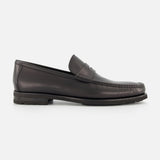 The TO BOOT Belfast Leather Loafer, a single black shoe with a low heel and moccasin-style toe, made in Italy, is shown in profile against a plain white background.