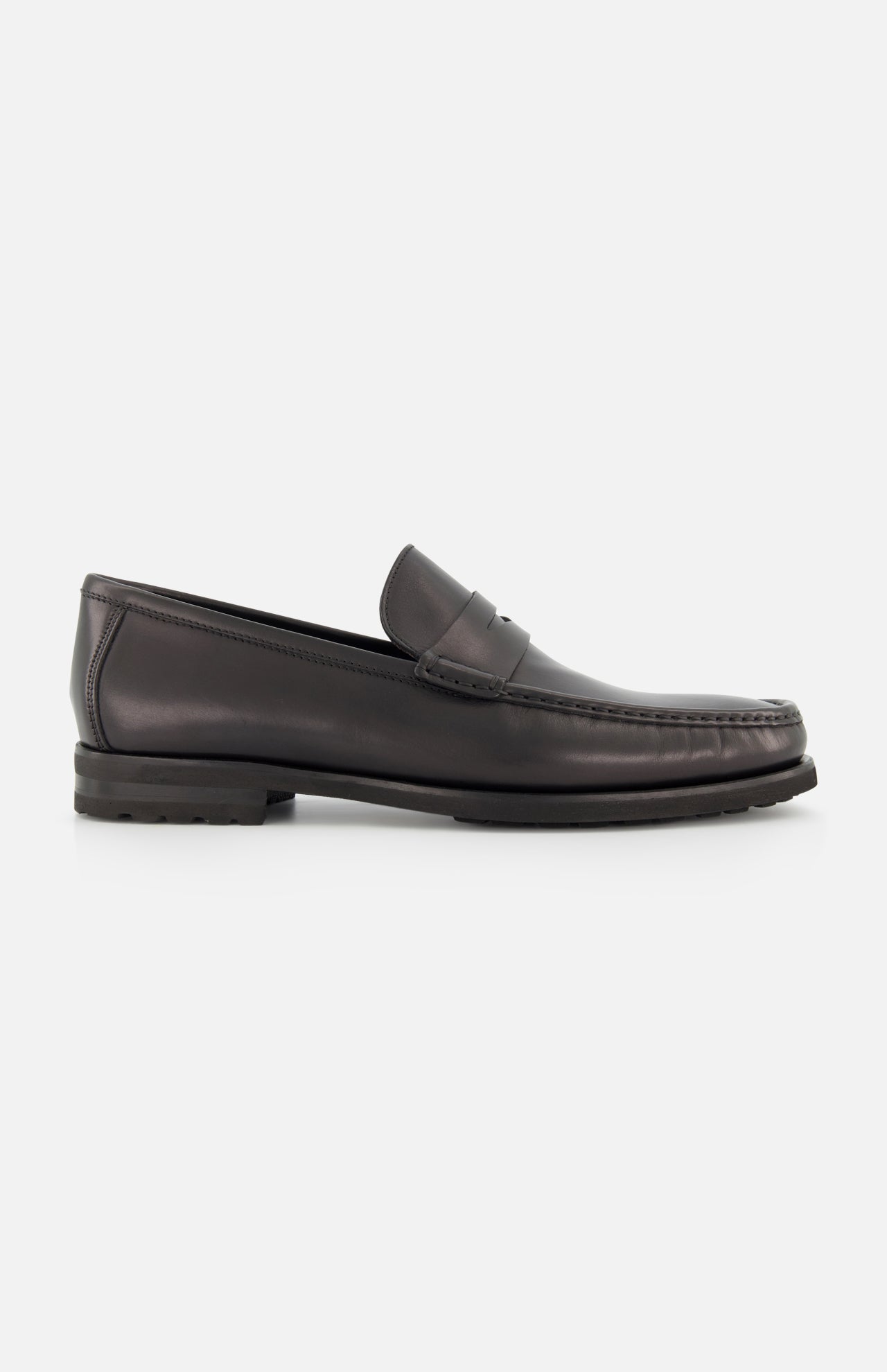 The TO BOOT Belfast Leather Loafer, a single black shoe with a low heel and moccasin-style toe, made in Italy, is shown in profile against a plain white background.