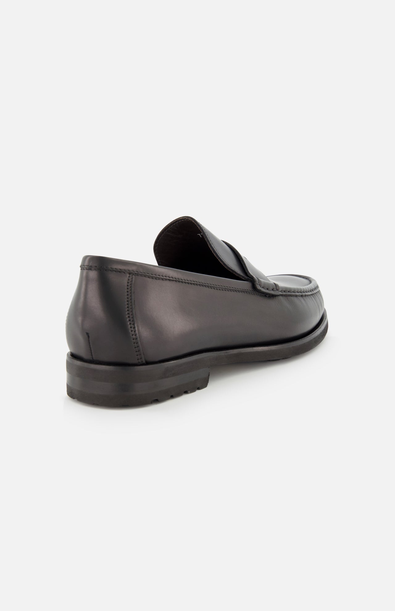 The TO BOOT Belfast Leather Loafer is pictured in black leather on a white background, angled to showcase its low heel, visible stitching, and refined Italian craftsmanship.