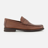 The TO BOOT Fischer Penny Leather Loafer, crafted in Italy from brown leather, is shown in profile on a plain white background. This single loafer features a low heel, a classic penny strap detail, and a textured surface.