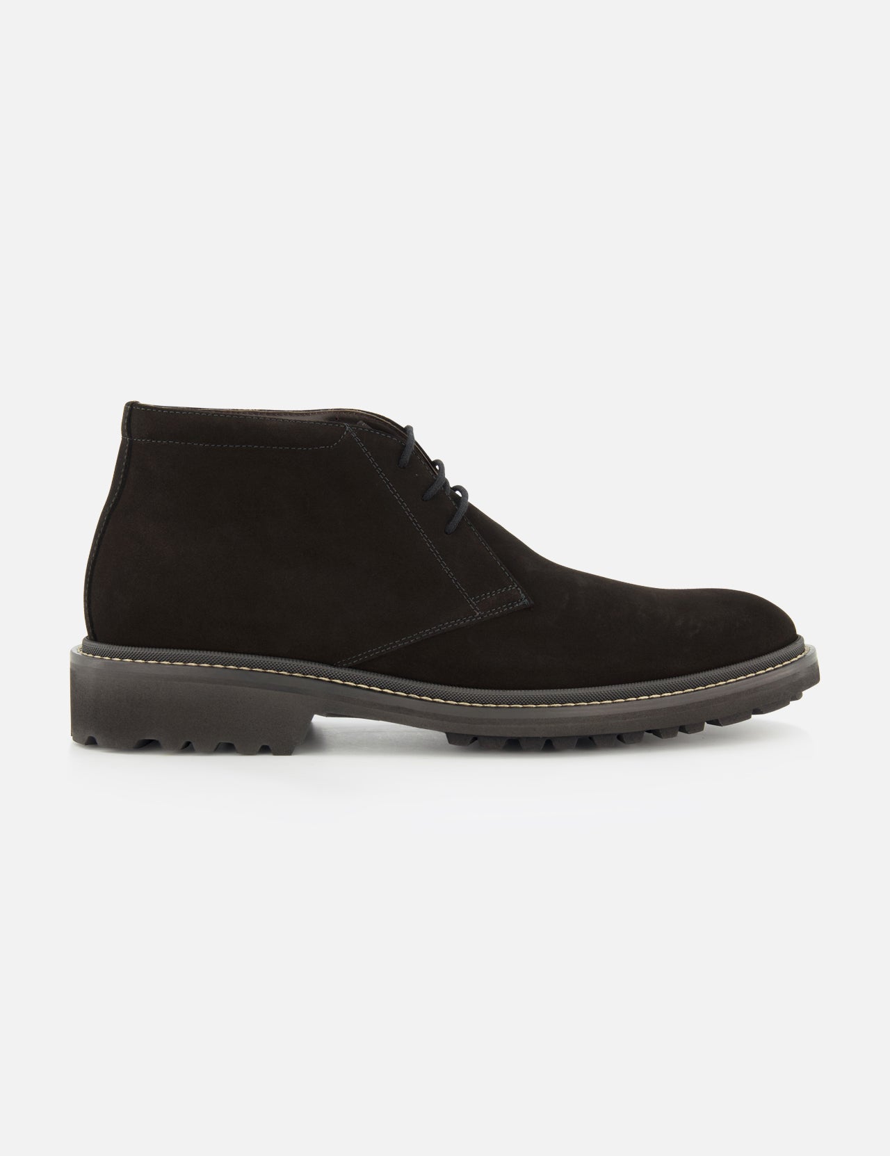 The Javier Suede Chukka Boot by TO BOOT is displayed in a side profile on a white background, featuring premium black suede, matching black laces, visible stitching, and a thick textured gray rubber sole—an essential choice for any men’s designer boot collection.