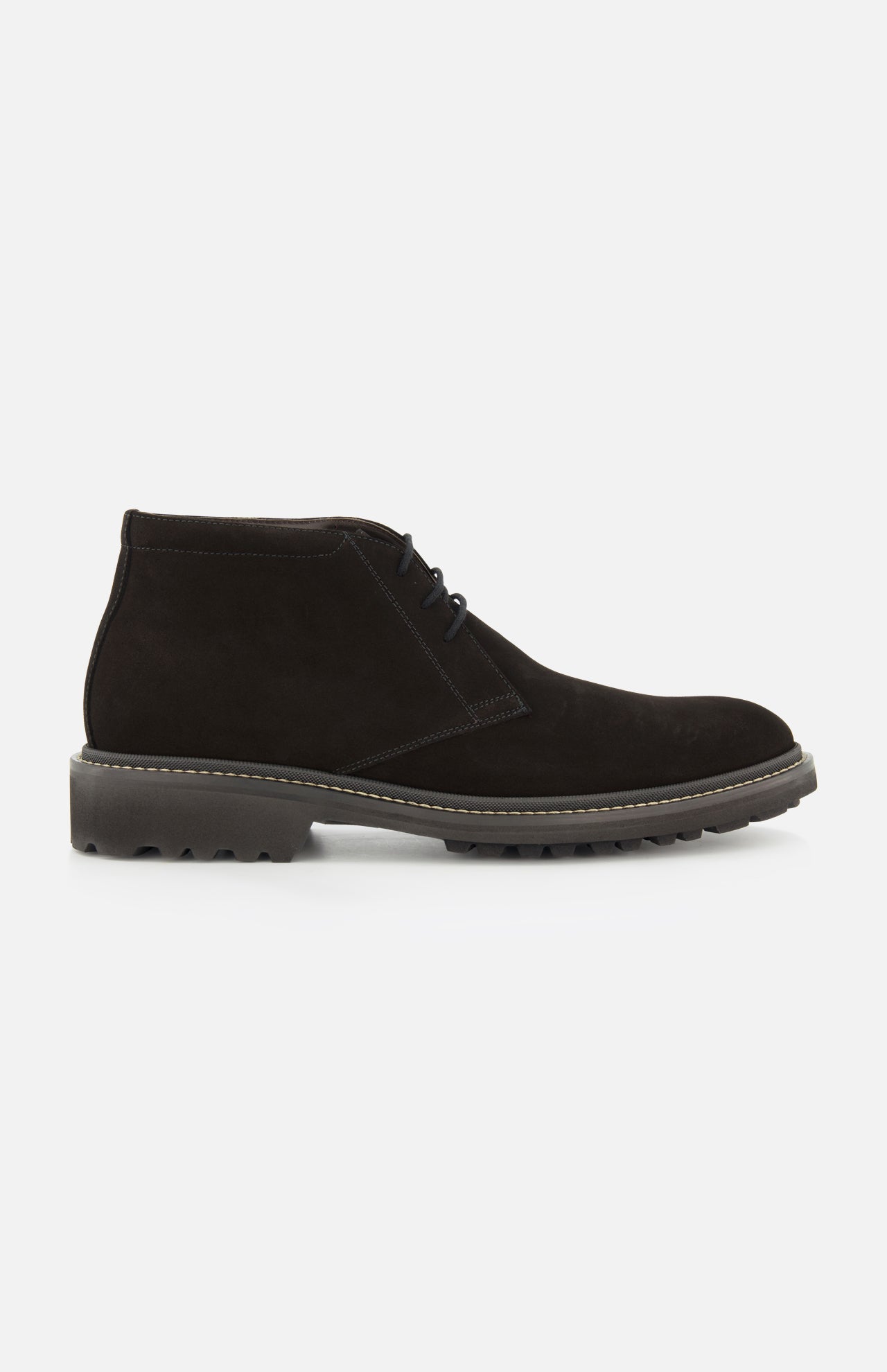 The Javier Suede Chukka Boot by TO BOOT is displayed in a side profile on a white background, featuring premium black suede, matching black laces, visible stitching, and a thick textured gray rubber sole—an essential choice for any men’s designer boot collection.