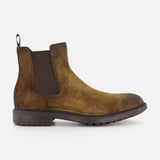 The Largo Suede Chelsea Boot by TO BOOT features rich brown suede with a dark elastic side panel, a convenient pull tab at the back, and a durable dark rubber sole. This classic men’s footwear essential is shown against a plain white background.
