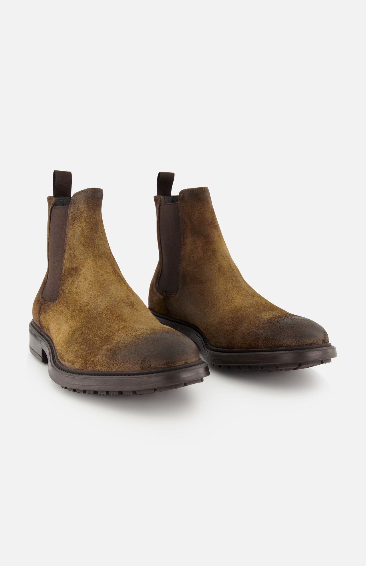 The Largo Suede Chelsea Boot by TO BOOT is a classic men’s footwear choice, crafted in brown suede with elastic side panels and durable black rubber soles, all showcased on a white background.