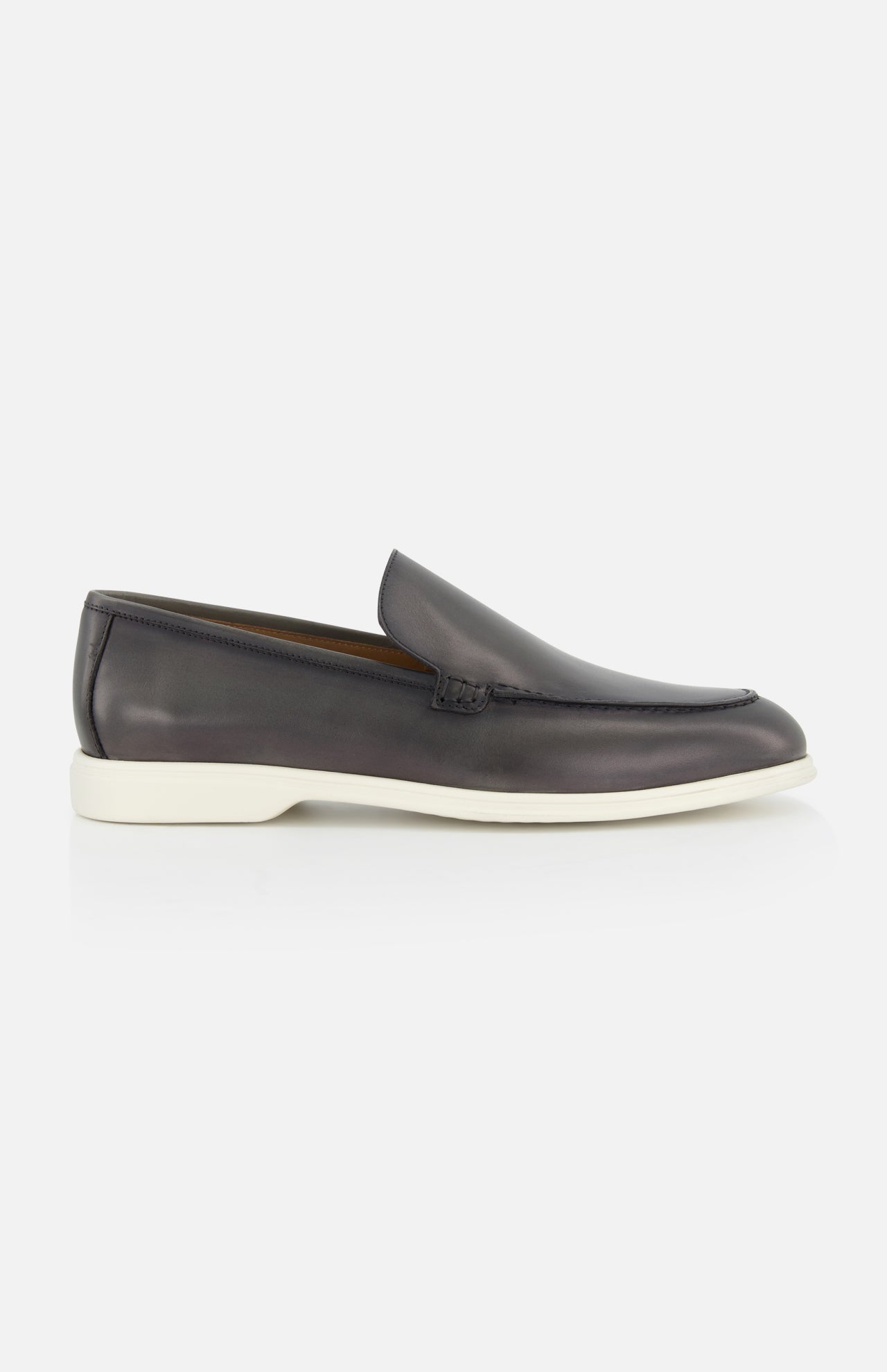 The TO BOOT Pacific Leather Hybrid Loafer is shown in black leather with a low profile and white rubber sole, displayed side view on a plain white background.