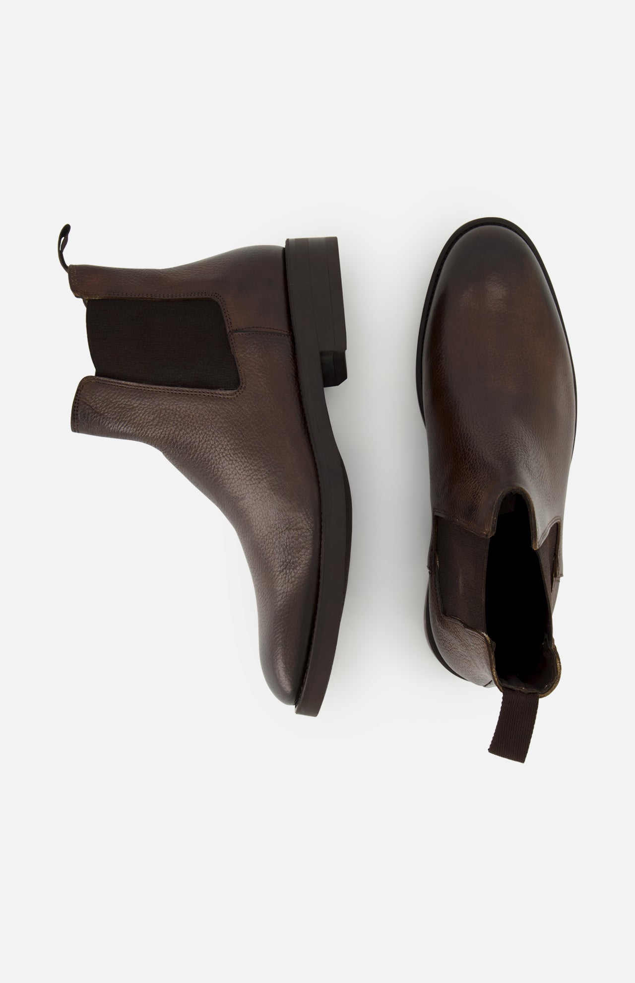 The Peabody Chelsea Boot by TO BOOT features brown grained leather, black elastic side panels, and pull tabs—shown from side and top views, these men’s fall boots are displayed on a white background.