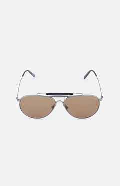 The TOM FORD Raphael Sunglasses feature aviator-style brown tinted lenses, thin silver metal frames, a black nose bridge, and black temple tips, shown against a white background.