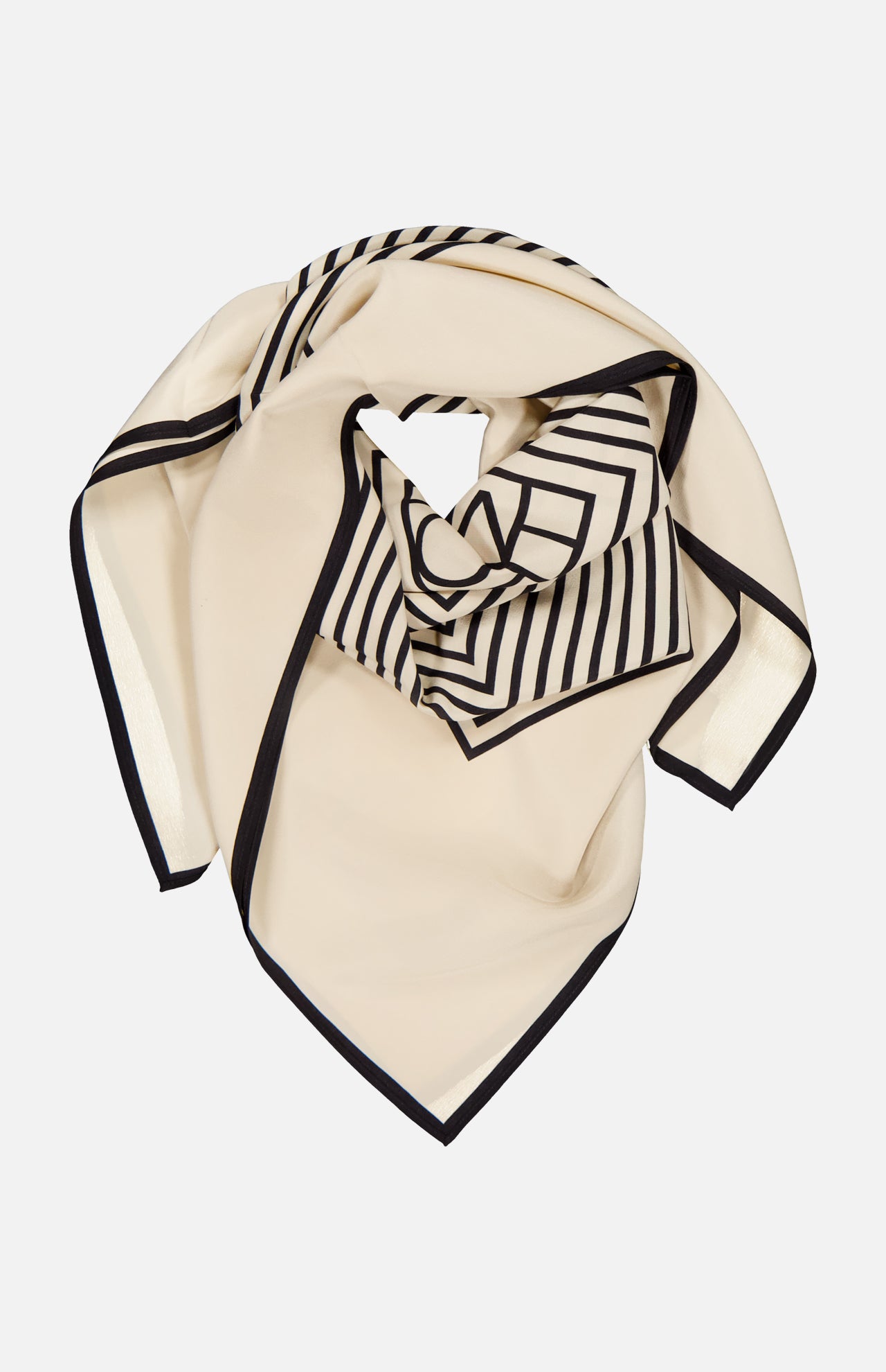 The TOTEME Centered Monogram Silk Scarf features cream silk with a black border and geometric stripes, styled in a loose fold—a chic accessory to elevate any woman's fashion look.