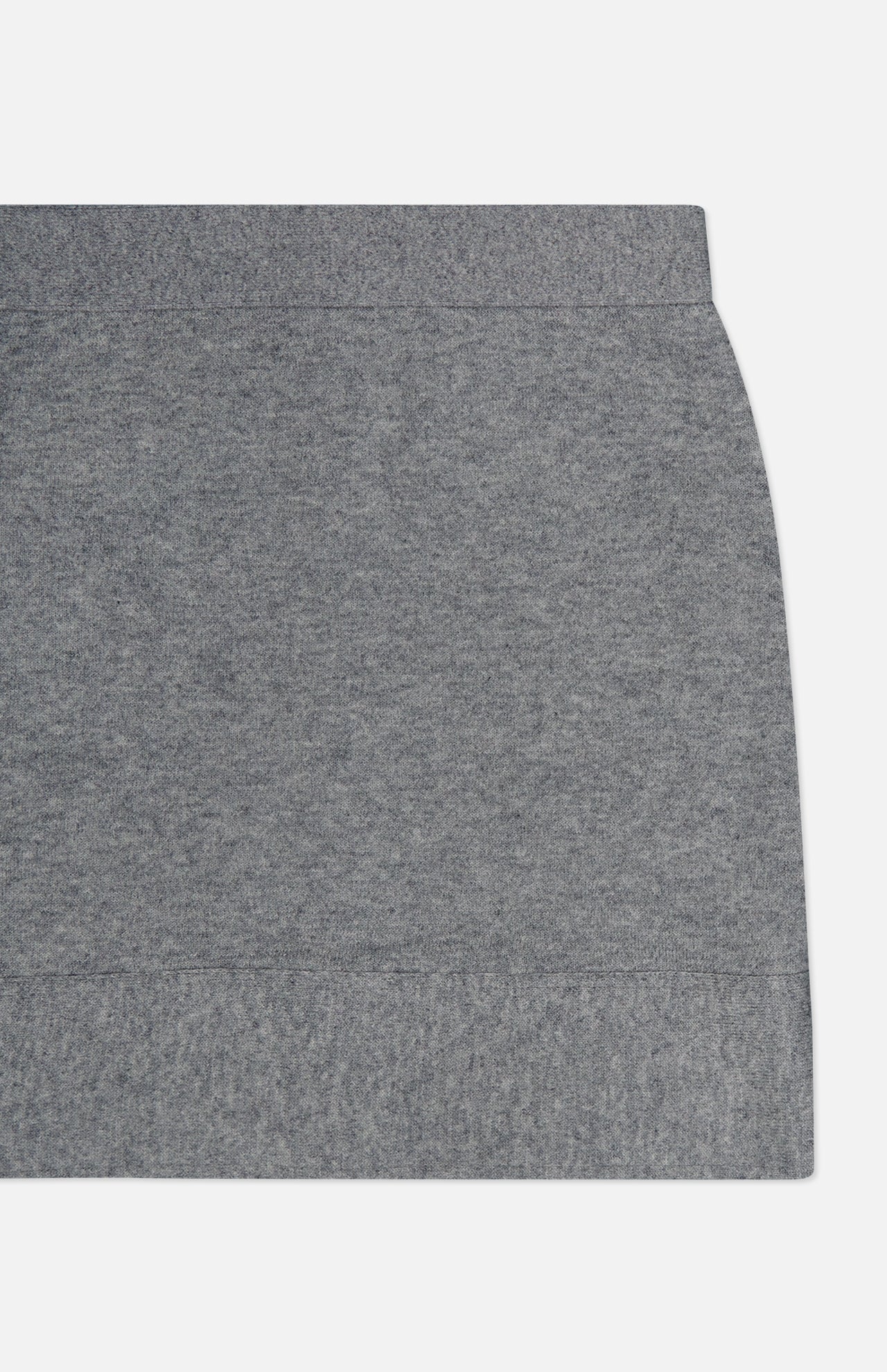 Close-up of the TOTEME Buttoned Cashmere Skirt in a slim fit grey design, featuring a ribbed waistband and hem, displayed against a white background. Only the upper right portion of the skirt is shown.