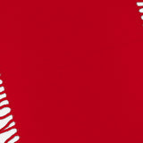 A vivid red TOTEME Wool and Cashmere Tassel Scarf is shown draped diagonally, with white fringed tassels visible along the left and top right edges. The arrangement leaves a bold expanse of red at the center, highlighting the luxurious Italian-made fabric.
