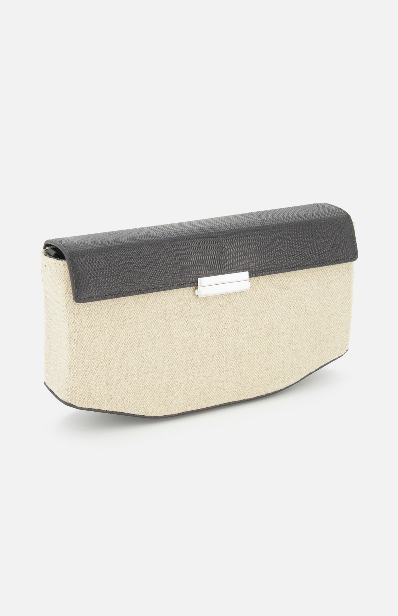 The TOTEME Clip Canvas Shoulder Bag is a rectangular clutch with a beige canvas and leather body, black textured flap, and a silver rectangular clasp on the front.