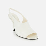 The Contour Naplack Slingback Heel by TOTEME is a white, premium leather peep-toe with a low black heel, shown on a plain white background.