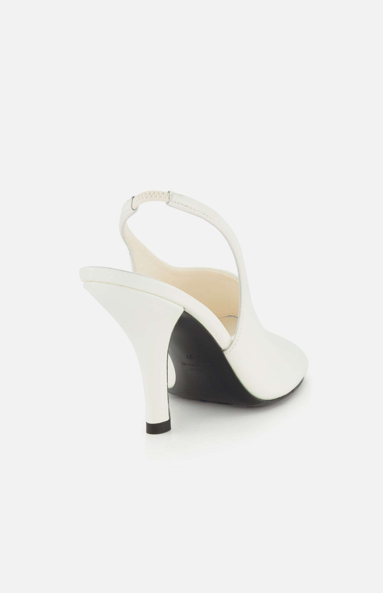 The Contour Naplack Slingback Heel by TOTEME is shown from the rear on a plain white background, featuring white leather, a pointed toe, and a curved heel.