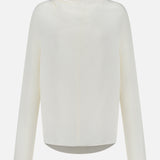 A back view of the TOTEME Cowl Neck Long Sleeve Blouse, featuring an off-white hue and minimalist design with a hooded silhouette, is photographed against a plain white background.