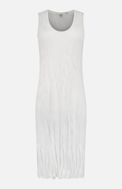 The TOTEME Crinkled Knit Tank Dress is a sleeveless white dress with a round neckline and subtle crinkled texture, shown on a plain white background.