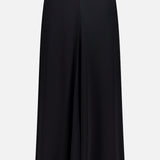 The TOTEME Flared Jersey Skirt is shown against a plain white background, featuring a high waist and wide, flowing silhouette for an effortlessly chic look.
