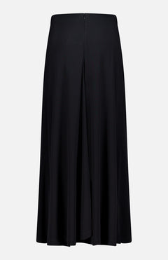 The TOTEME Flared Jersey Skirt is a black, ankle-length skirt with a high waist, center seam, and subtle front slit, shown against a plain white background.