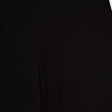 Close-up of the TOTEME Flared Jersey Skirt fabric in black, featuring a visible seam and black zipper at the top.