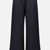 TOTEME Fluid Drawstring Trouser Pants in black, crafted from a lyocell-linen blend with wide legs, an elastic waistband, and drawstring waist, shown against a plain white background.