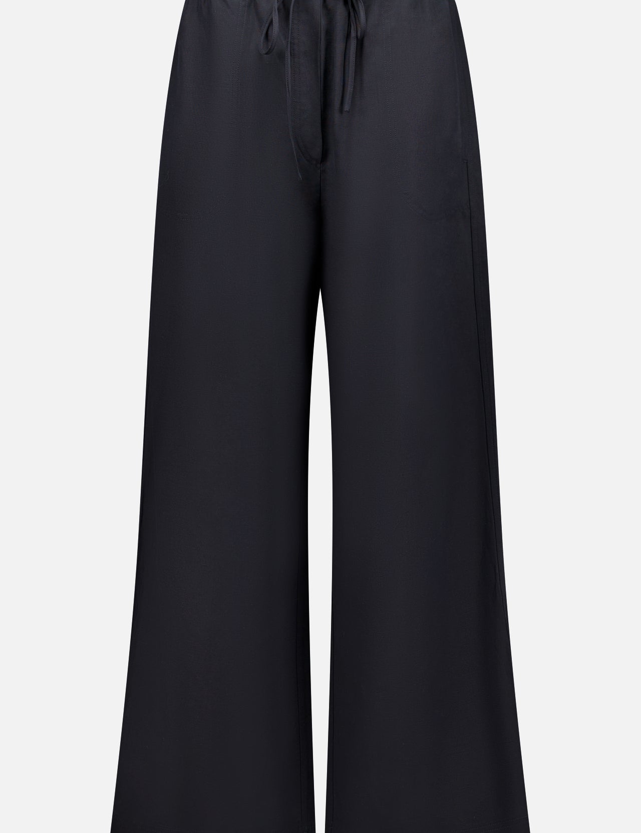TOTEME Fluid Drawstring Trouser Pants in black, crafted from a lyocell-linen blend with wide legs, an elastic waistband, and drawstring waist, shown against a plain white background.
