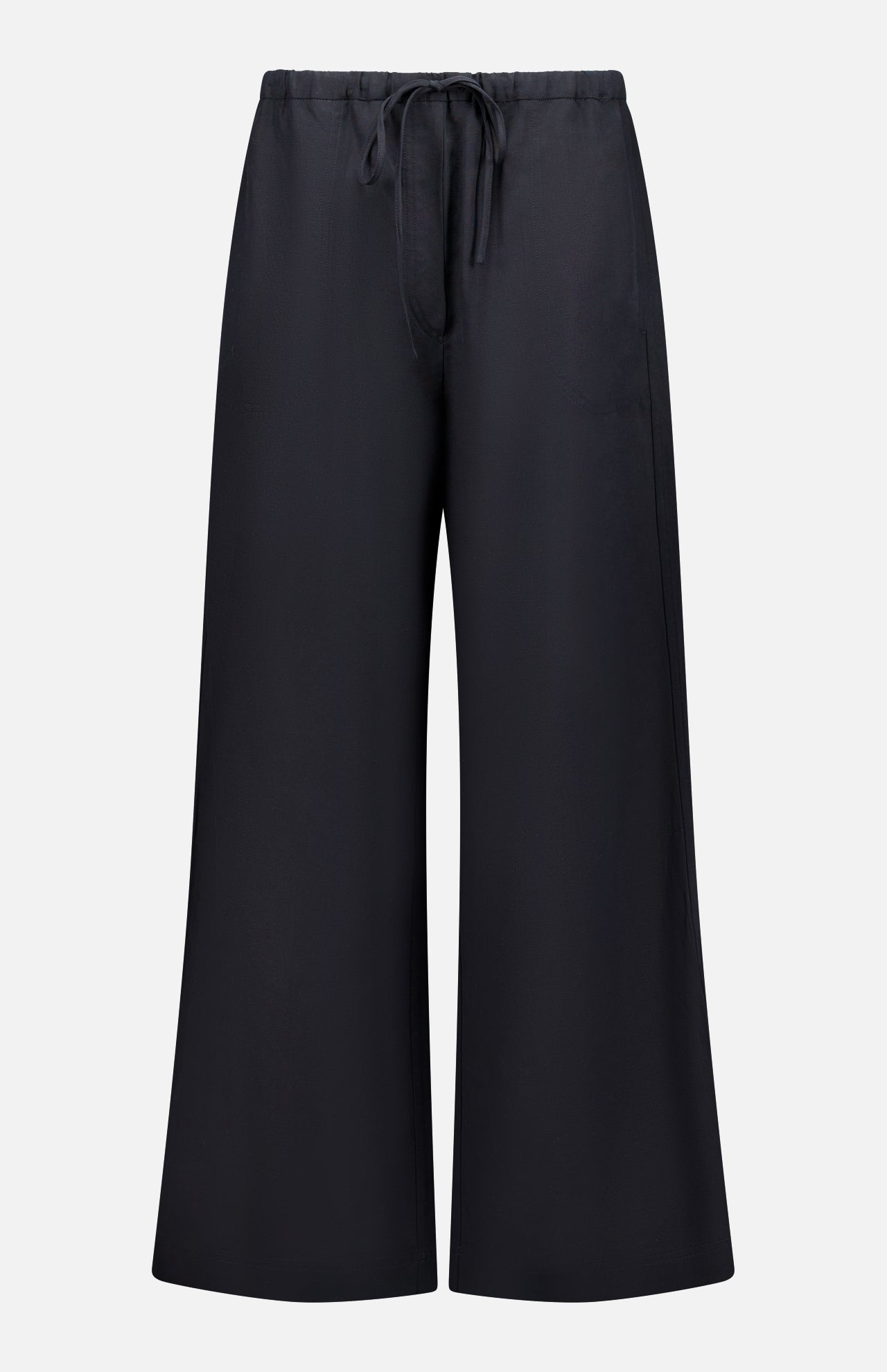 TOTEME Fluid Drawstring Trouser Pants in black, crafted from a lyocell-linen blend with wide legs, an elastic waistband, and drawstring waist, shown against a plain white background.