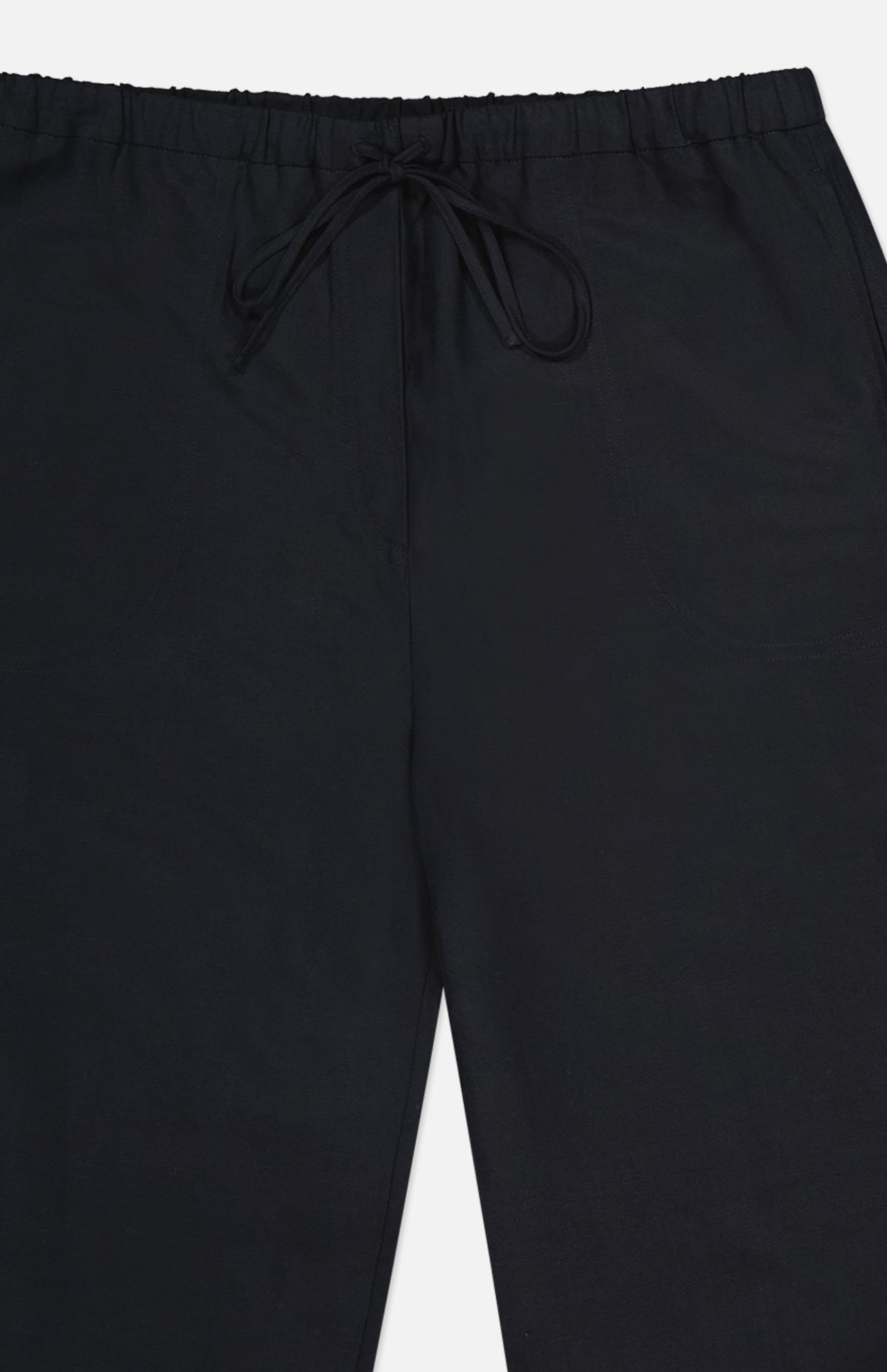 TOTEME Fluid Drawstring Trouser Pants in a soft lyocell-linen blend, featuring a drawstring and elastic waistband. Shown waist to upper legs on a plain white background.