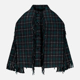 The TOTEME Fringed Scarf Jacket is a dark green and black wool-blend plaid cape, featuring fringe along the edges and button closures down the front, displayed on a plain white background.