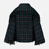A back view of the TOTEME Fringed Scarf Jacket, a dark plaid wool-blend piece in green and black tones, featuring fringe detailing along the upper back, shoulders, and sleeve edges.