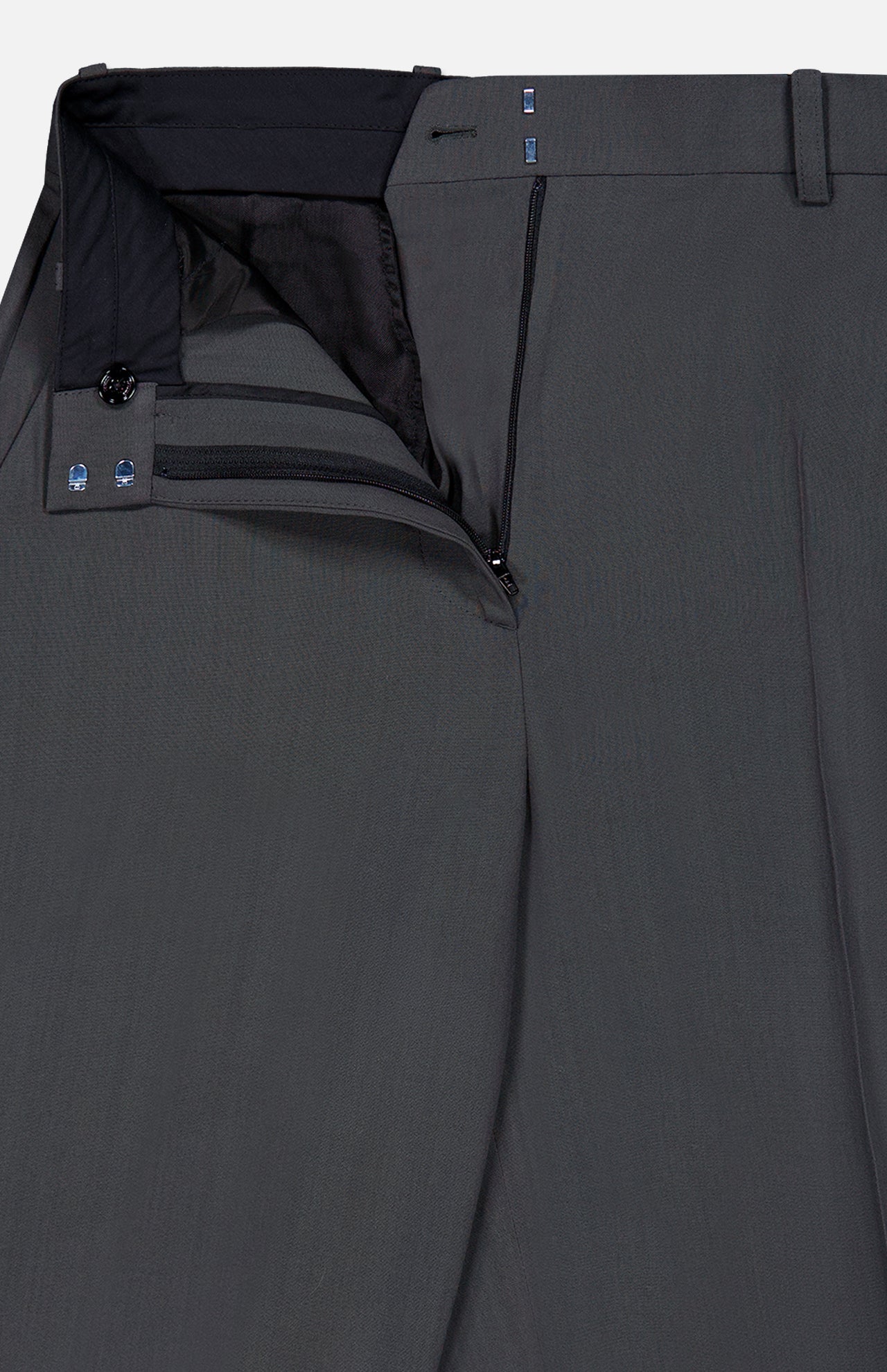 A pair of TOTEME High-Waisted Trouser Pants in dark grey, featuring a partially open waistband with zipper and button fly, showcasing the inner lining and belt loops at the top—ideal for those who appreciate classic office style.