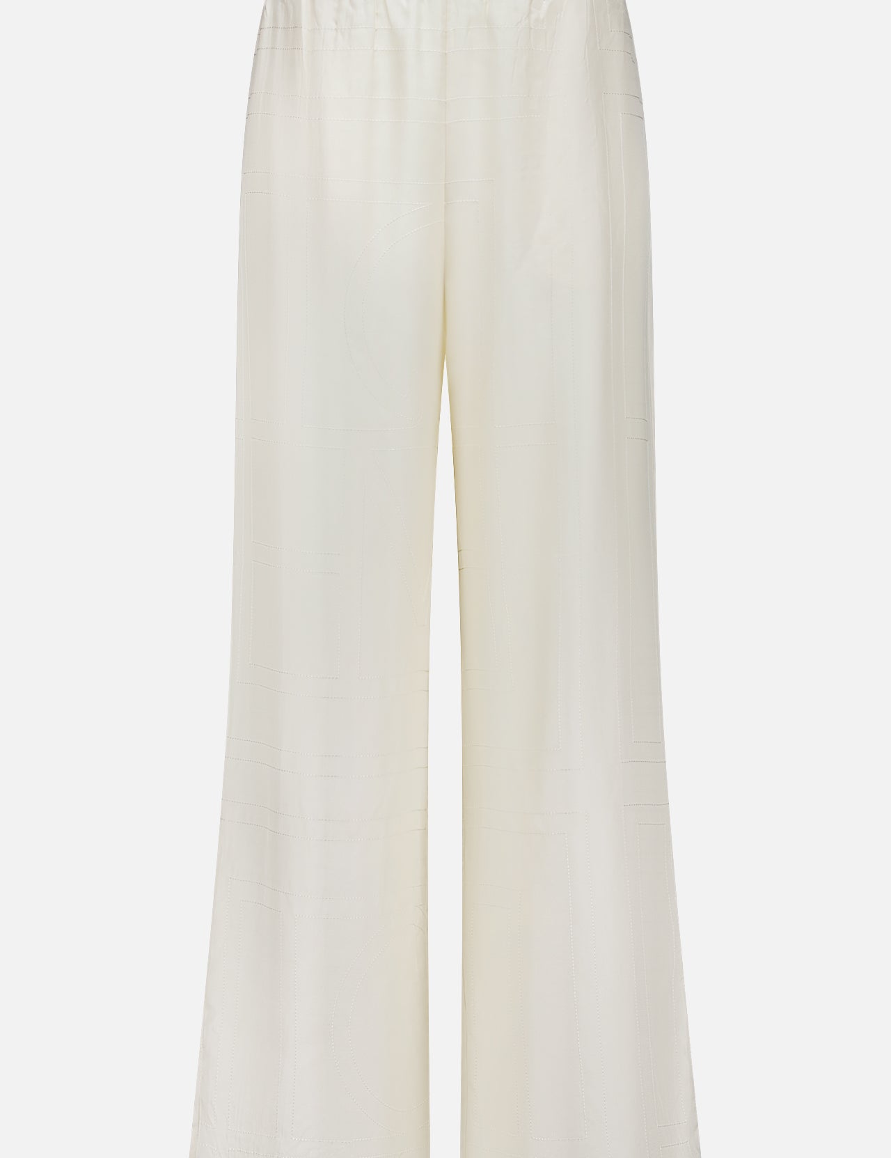 The TOTEME Monogram Silk PJ Bottoms are wide-leg, high-waisted ivory trousers with an elastic waistband, crafted from lightweight silk and detailed with a subtle embroidered monogram, shown against a plain white background.