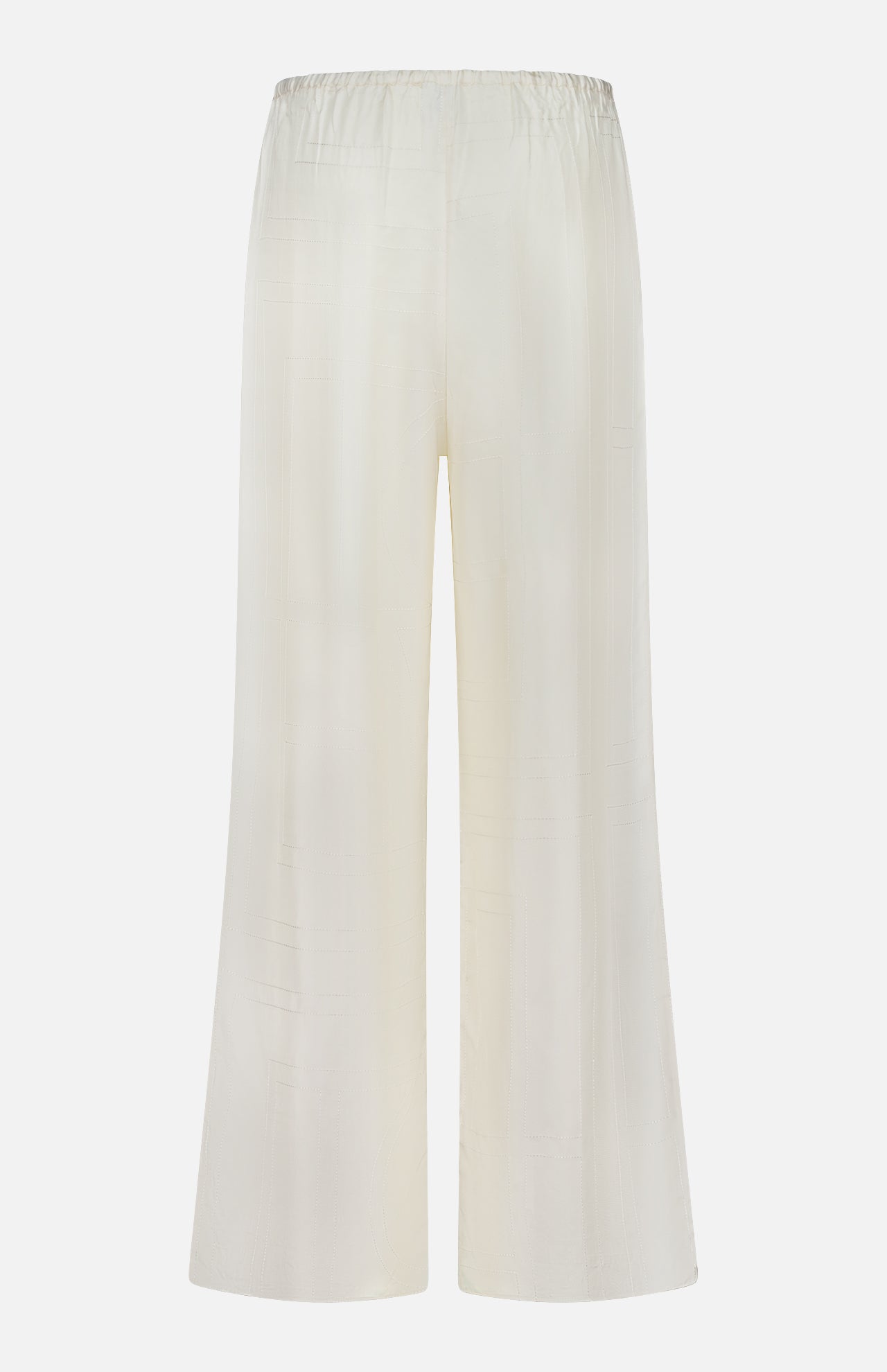 Back view of TOTEME’s Monogram Silk PJ Bottoms in cream, featuring a loose fit, straight legs, elastic waistband, and subtle embroidered monogram, displayed against a plain white background.
