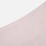 Close-up of TOTEME’s Silk-blend Parachute Skirt in pale pink, featuring lightly wrinkled fabric and a vertical seam, photographed against a white background.